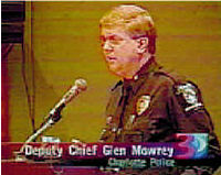 Chief Mowrey speaking at a microphone